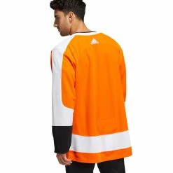 PHILADELPHIA FLYERS ADIDAS ADIZERO PRIMEGREEN AUTHENTIC ORANGE HOME JERSEY -Atlantic Division Shop PHILADELPHIA FLYERS ADIDAS ADIZERO PRIMEGREEN AUTHENTIC ORANGE HOME JERSEY MODEL BACK