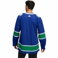VANCOUVER CANUCKS ADIDAS ADIZERO PRIMEGREEN AUTHENTIC BLUE HOME JERSEY 9 VANCOUVER CANUCKS ADIDAS ADIZERO PRIMEGREEN AUTHENTIC BLUE HOME JERSEY -Atlantic Division Shop VANCOUVER CANUCKS ADIDAS ADIZERO PRIMEGREEN AUTHENTIC BLUE HOME JERSEY MODEL BACK